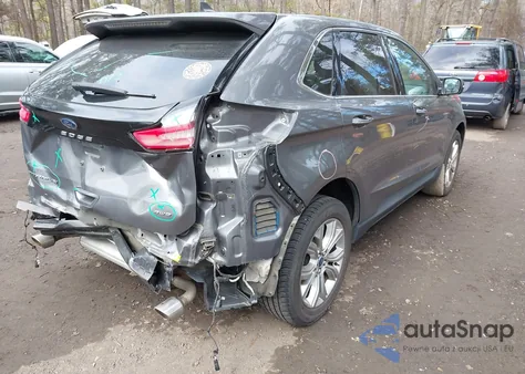 2022 Ford Edge Titanium z USA, uszkodzony, nr VIN 2FMPK4K95NBB07090